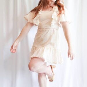 MABLE Swiss Dot Ruffle Mini Dress in Beige. - L